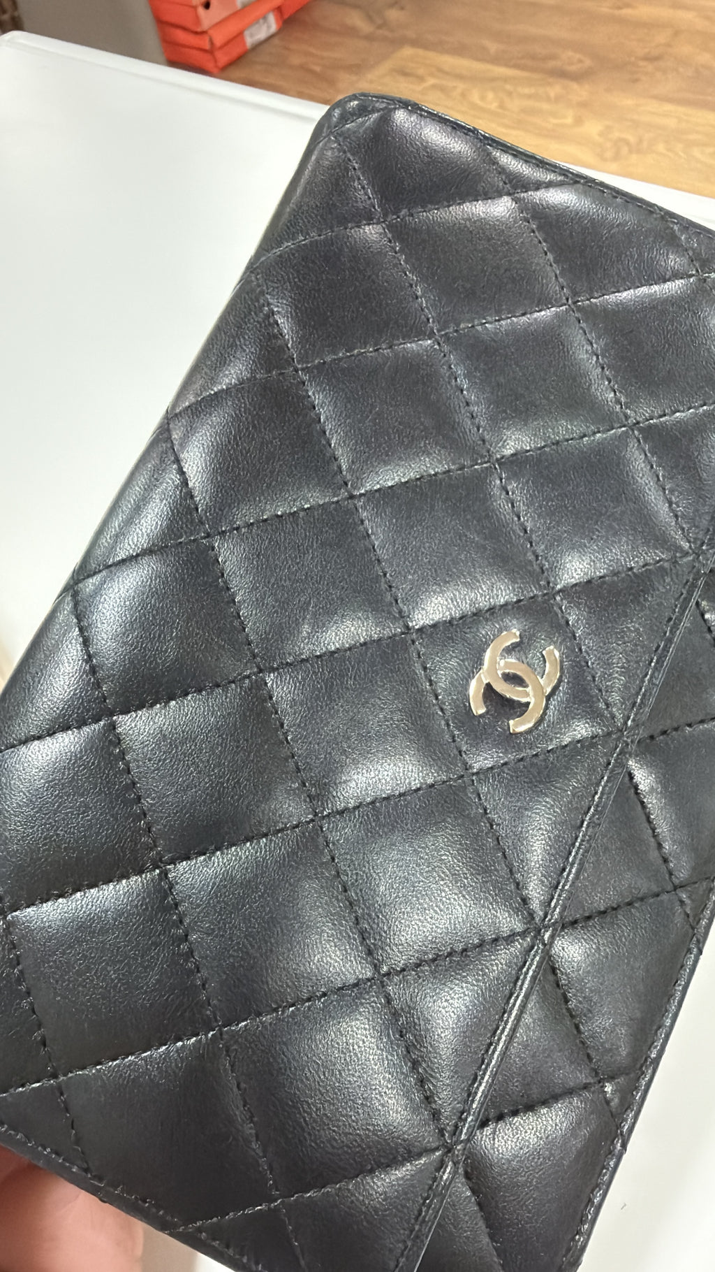Chanel Black WOC with dust