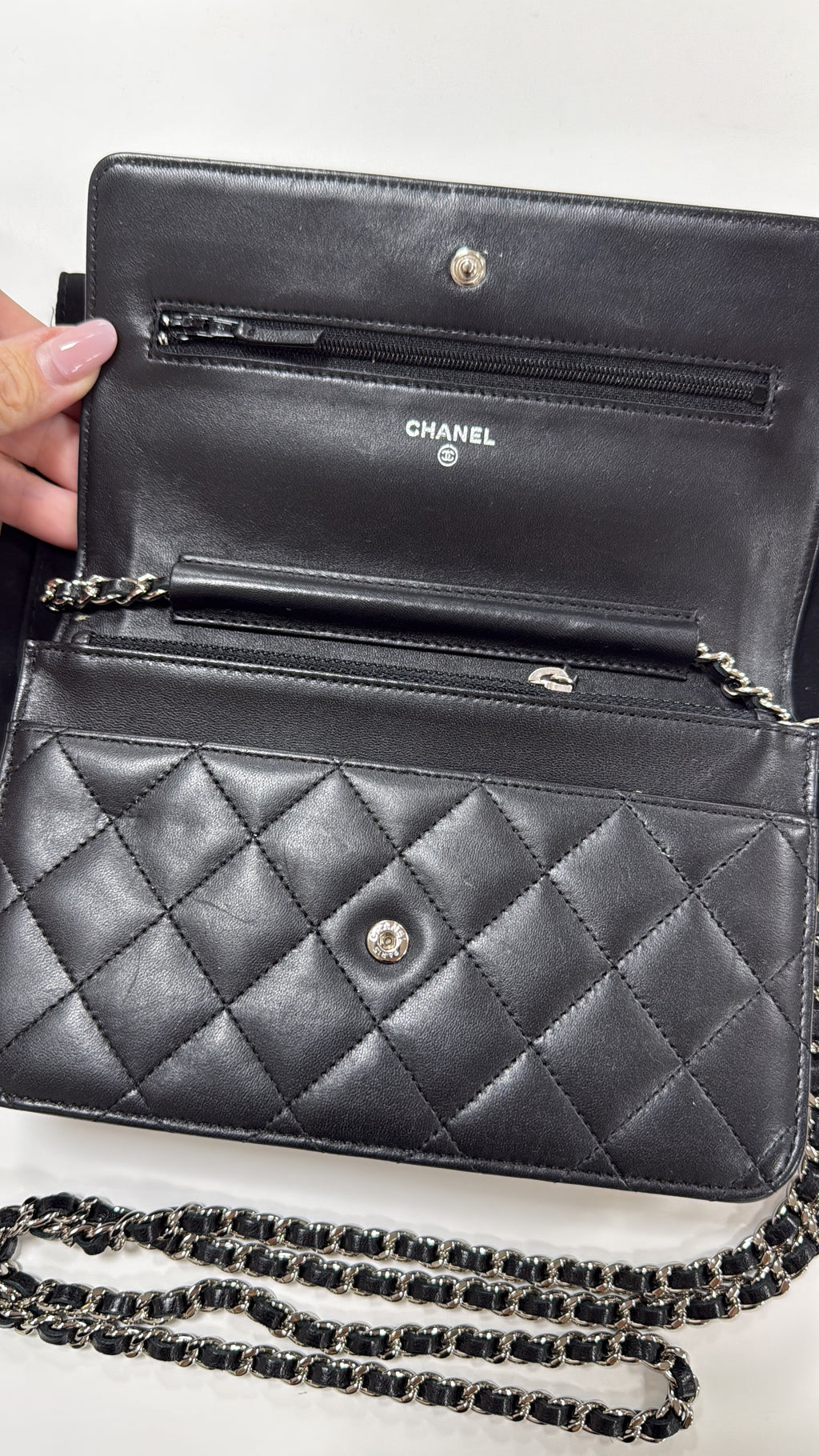 Chanel Black WOC with dust