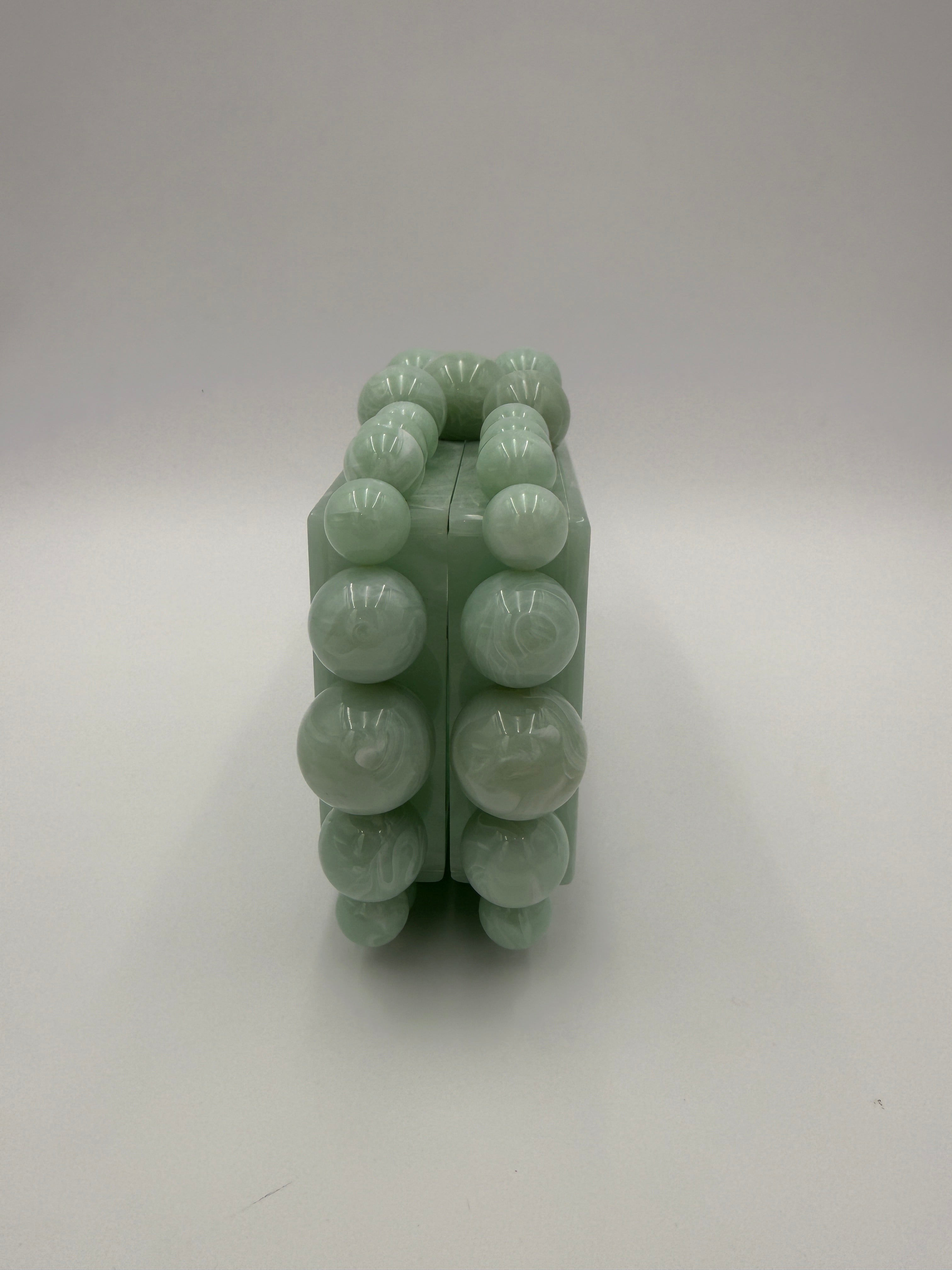 Cult Gaia Soft green acrylic clutch