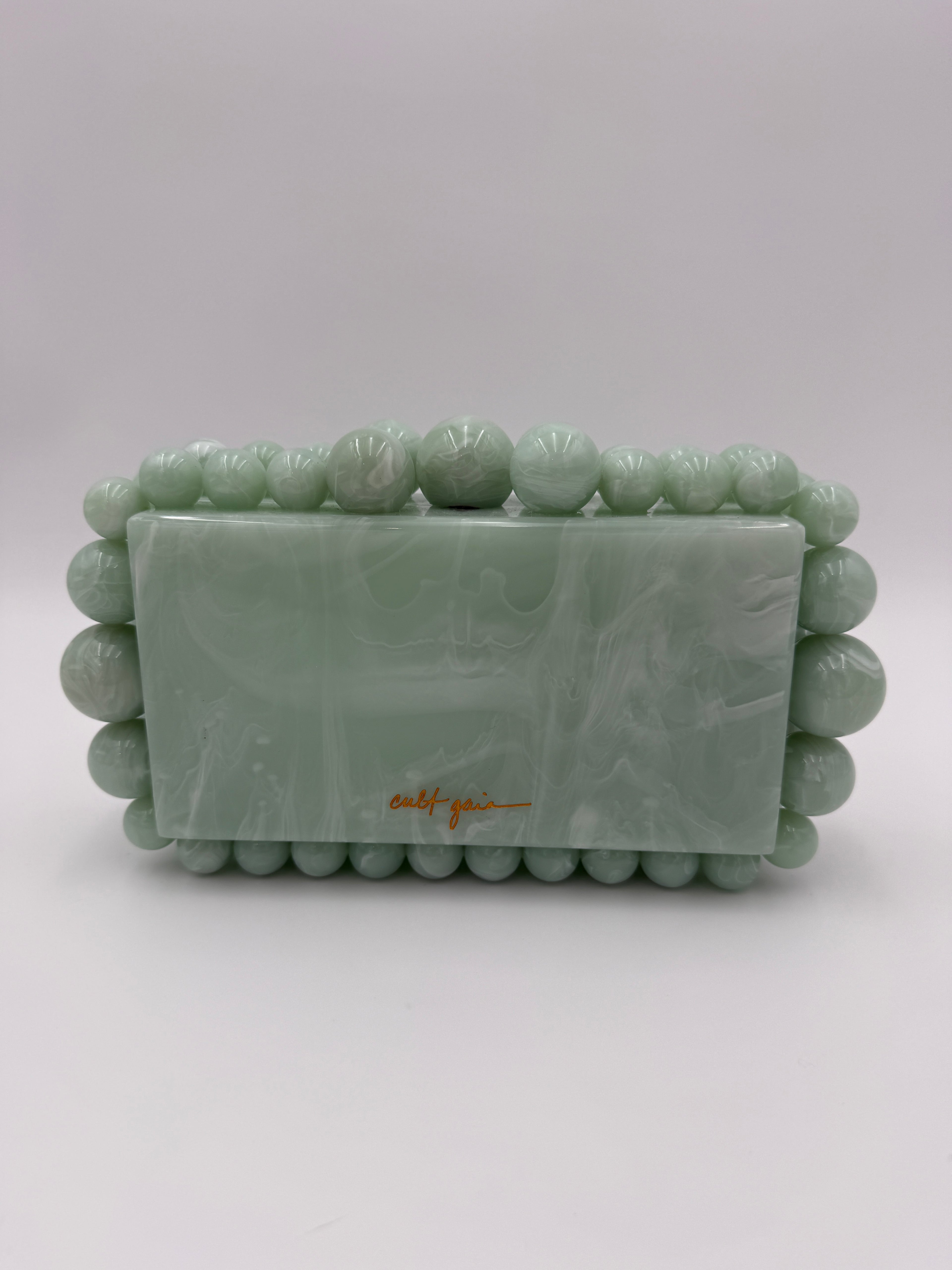 Cult Gaia Soft green acrylic clutch