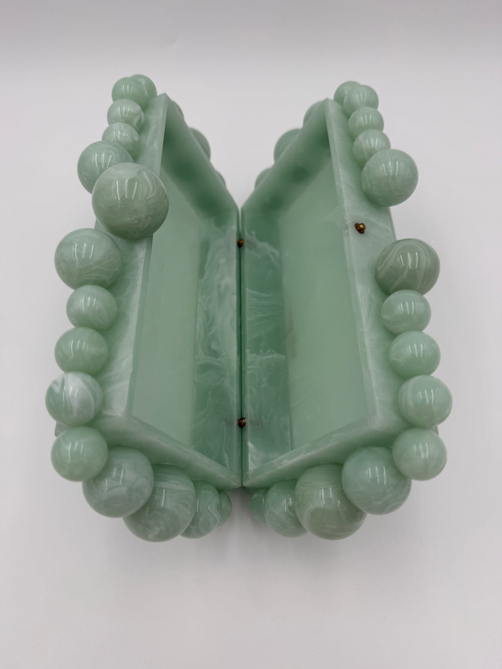 Cult Gaia Soft green acrylic clutch