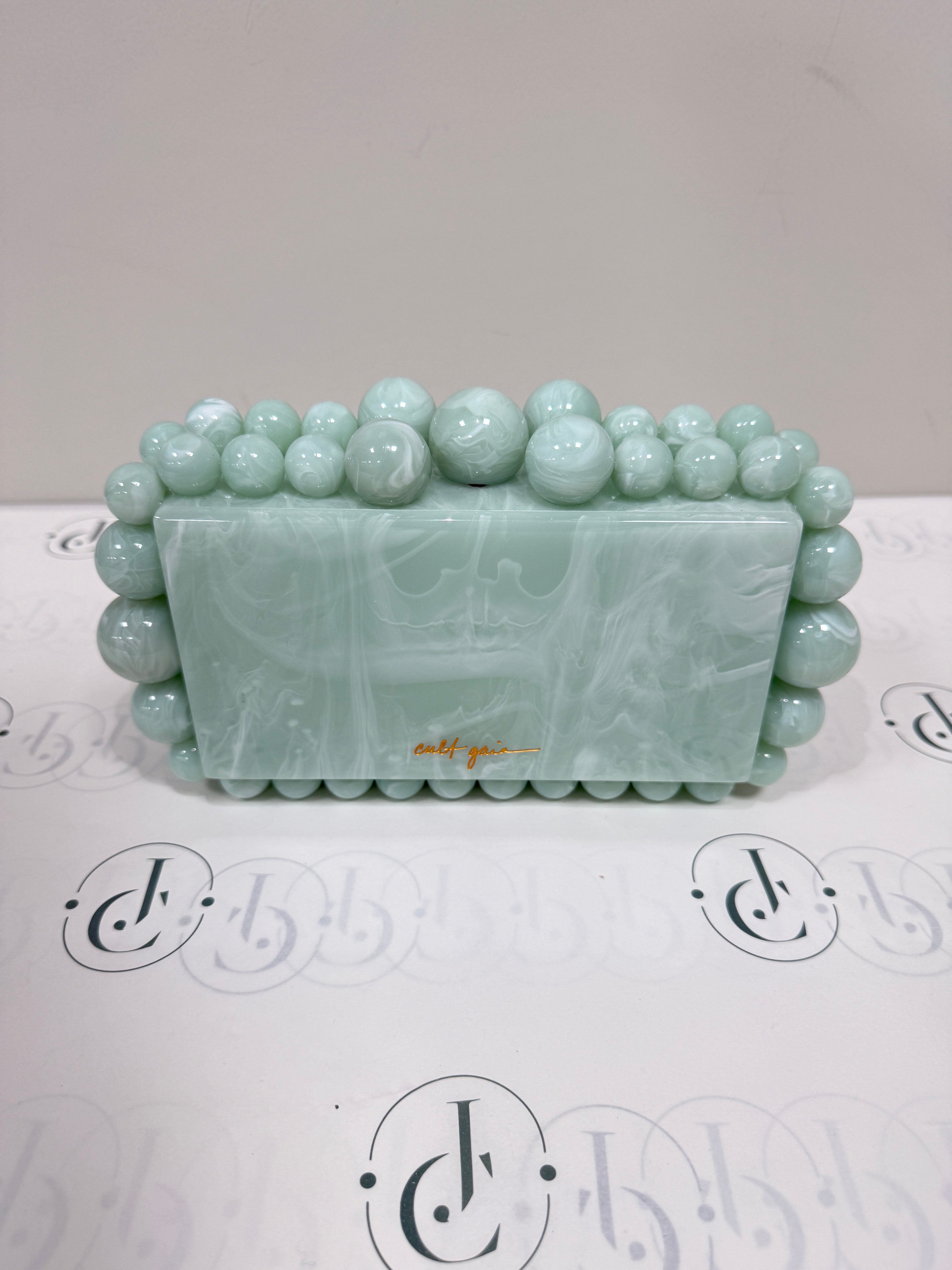 Cult Gaia Soft green acrylic clutch